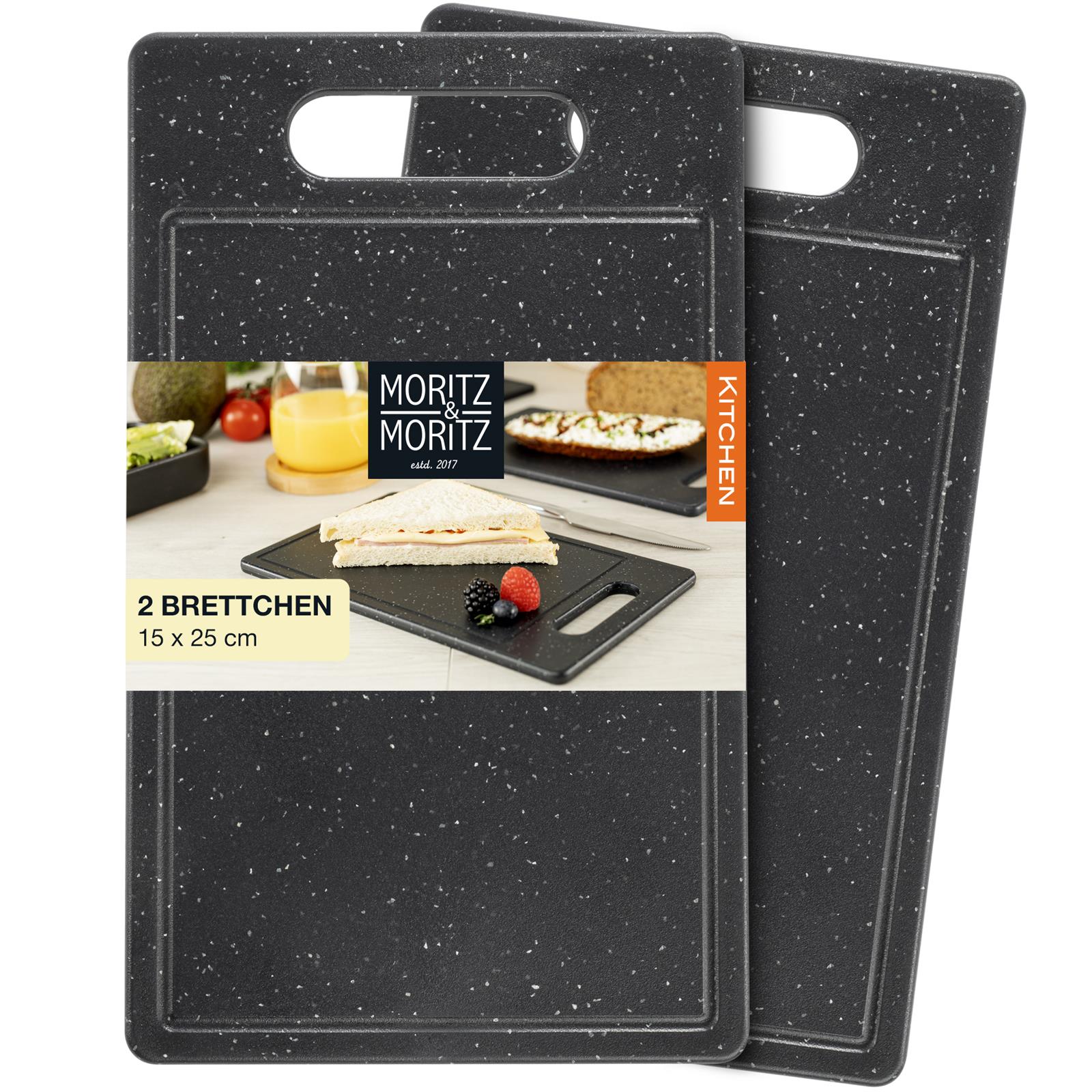 Schneidebrett 2er-Set mit Saftrille – Granitoptik Schwarz – RÖMERTOPF® Küchenbrett klein, rutschfest und stilvoll Zweiteiliges Schneidebrett-Set in Granit-Schwarz mit Saftrille, beide Bretter rechteckig, flach und aus robustem Material, auf weißem Hintergrund präsentiert.